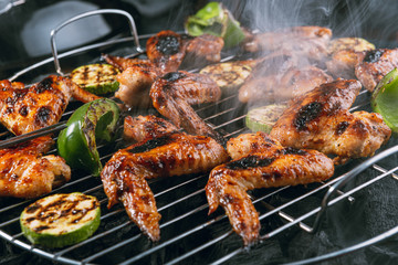 grilled chicken wings and vegetables