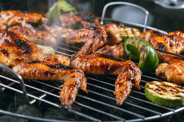 grilled chicken wings and vegetables