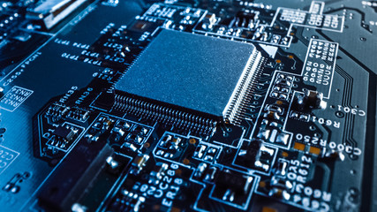 Close-up Macro Shot of a Microchip, CPU Processor with Printed Circuit Board / Computer Motherboard with Components: Inside of Electronic Device, Parts of Supercomputer. 