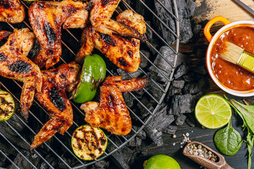 grilled chicken wings and vegetables