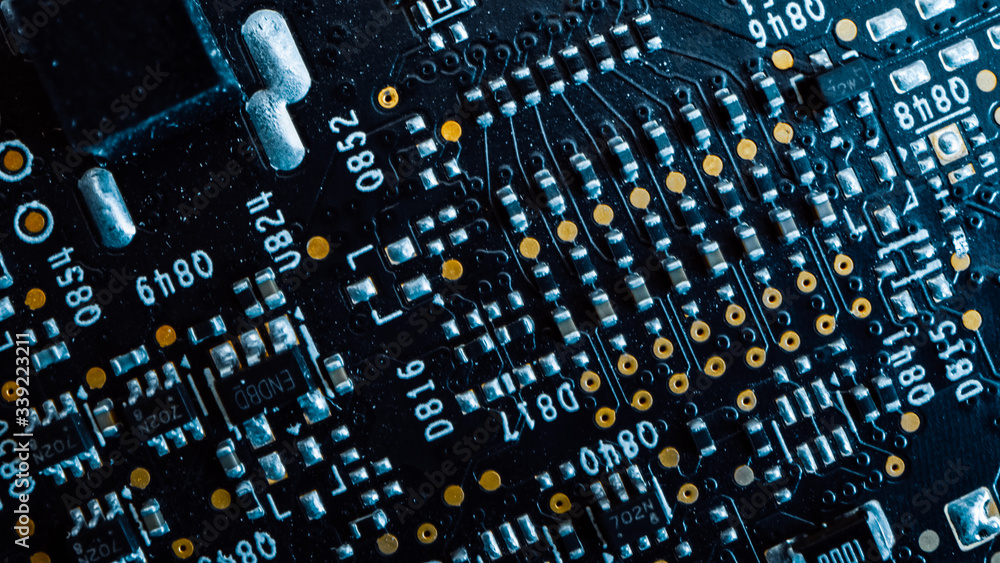 Poster macro close-up shot of printed circuit board, computer motherboard components: microchips, cpu proce