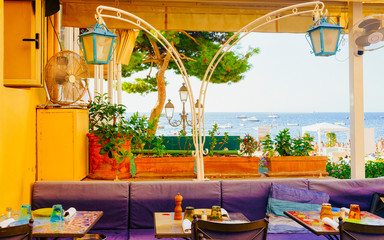 Terraced street cafe in Positano town on Amalfi Coast reflex