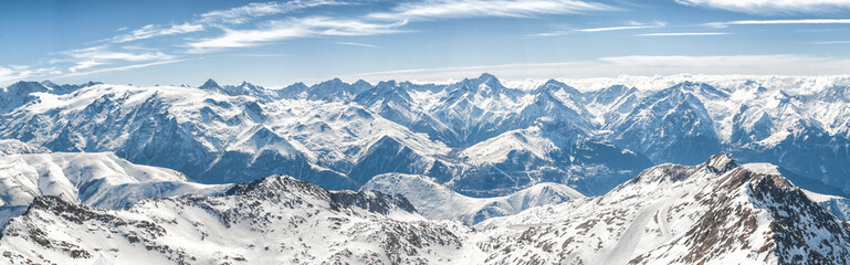 Fototapeta na wymiar The grandiose and amazing panoramic view of freeze mountain range Alpes landscape scene from the highest nature peak panorama viewpoint. French Alps