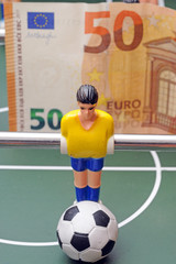 Table soccer football game - sports betting in the world of football - pleyers and euro money 