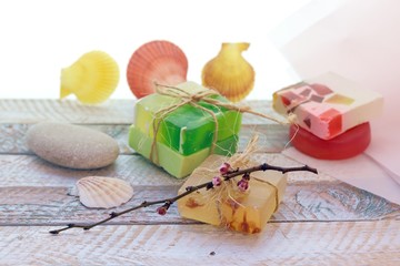 Soaps, shells, concept of cleanliness, body care, spa, natural cosmetics, healthy lifestyle