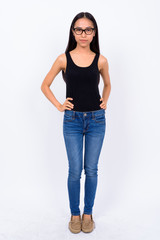 Full body shot of young Asian nerd woman