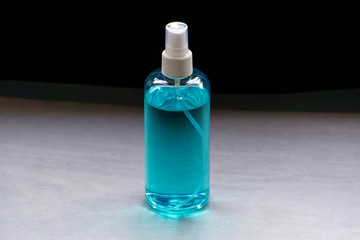 Spray bottles that contain alcohol are used for cleaning.