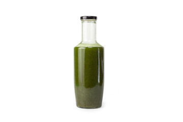 Fresh celery spinach juice in a glass bottle isolated on white background. Healthy eating Detox juice diet.