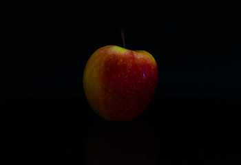 Apple in dark black background