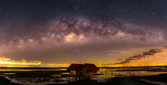 The Milky Way (Bridge over Thale Noi and Twin Houses, Phatthalung Province, Thailand) on a clear clear day