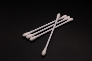 Ear sticks on a black background