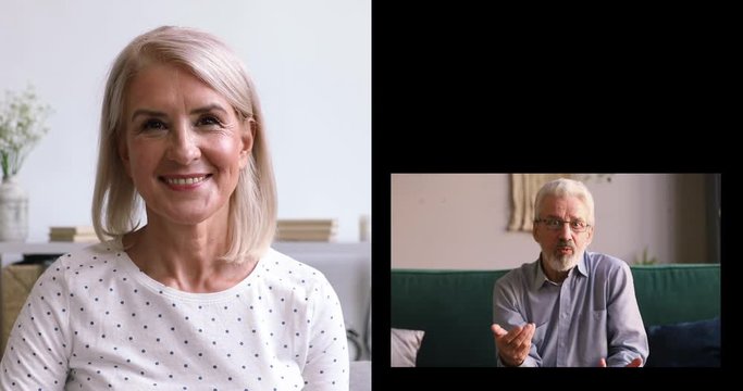 Older elderly man and woman talking by web cam video call. Middle aged senior grandparents couple communicating in virtual dating chat. Happy mature grandpa and grandma meeting online using app.
