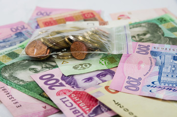 different Ukrainian hryvnia and coins.