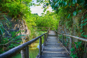 Obraz premium Tam Coc National Park, wooden bridge in a beautiful place