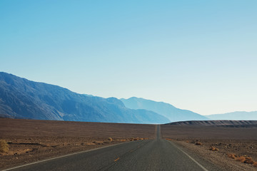 Fototapeta na wymiar Rural highway in the desert.