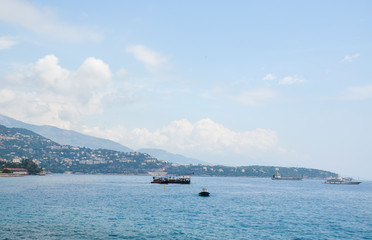 A famous view of Mediterranean coastline with ships, yachts and luxury residential apartment...