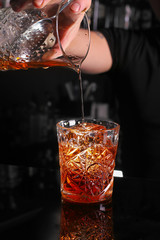 Fresh cocktail drink on dark background