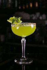 Fresh cocktail drink on dark background