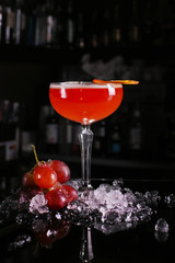 Fresh cocktail drink on dark background