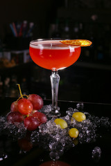 Fresh cocktail drink on dark background