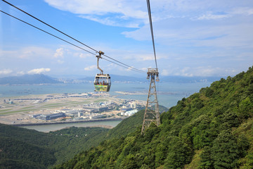 Fototapeta premium The cable car take passengers to high mountain
