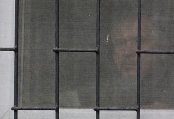 silhouette men at the window