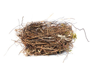 Isolated bird's nest made of thin branches to lay eggs and breed offsprings on a white background.