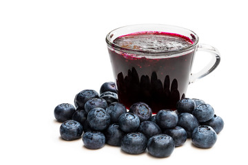 Homemade blueberry jam in glass cup isolated on white