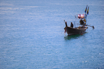 Obraz premium one boat in wide sea