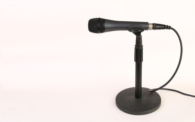 Microphone with wire on a white back ground