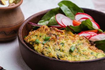 Zucchini fritters with green salad and Greek yogurt dipping sauce