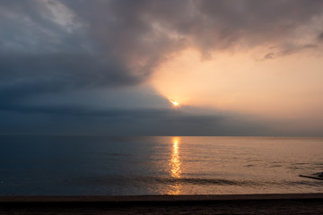 Sunrise over clouds at the beach