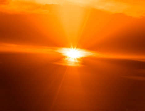 Dramatic God Rays During Burning Sunset Background