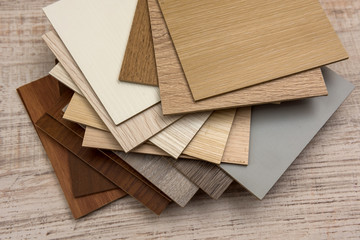 color sample boards for design on wooden desk.