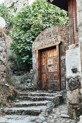 The abandoned Greek village of Kayakoy, Fethiye, Turkey. Ghost Town Kayakoy. Turkey, evening sun. Ancient abandoned buildings of rock and stone.
