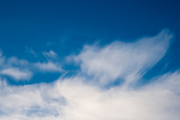 View of the blue sky with clouds. The atmosphere in the daytime