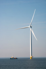 Windmill park westermeerdijk Netherlands, wind mill turbine with blue sky in ocean, green energy © Fokke Baarssen