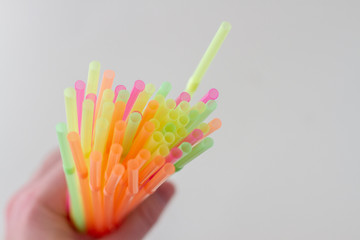 disposable plastic straw holds in hand