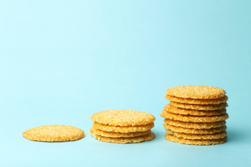 Sesame cookies on a blue background. Baking and sweets background. Food infographics concept