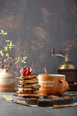 Obraz premium fritters with strawberries and chocolate