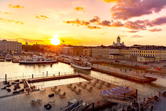 Allas Sea Pool sauna, Market Square and Helsinki Cathedral at sunset.