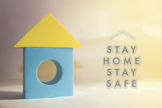 Health care and treatment during coronavirus or covid-19 outbreak with text STAY HOME STAY SAFE and house from toy block.
