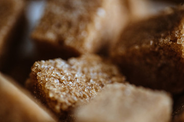 Close up photo of brown sugar bricks in a bowl, stylish food photo