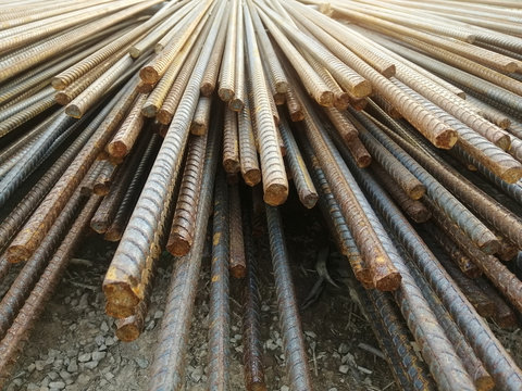 Steel rods or bars used to reinforce concrete. Deformed steel. Construction rebar steel work reinforcement in conncrete structure of building. 