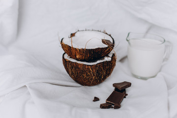 Coconut milk. Organic vegetable milk. Ripe Coconuts with Chocolate