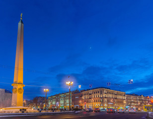 Cityscape of St. Petersburg at night with Leningrad Hero City Obliesk on the left