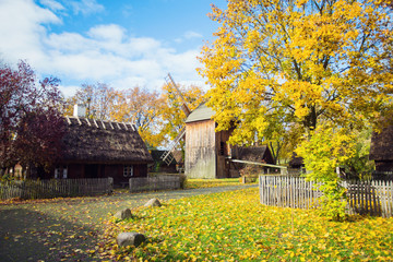 Old wooden cottage houses in skansen in Torun, Poland © aniad