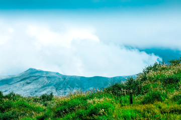 Aso volcano with beautiful views and a lot of smoke from the chimney