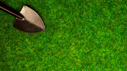 bayonet shovel on goose green grass top view
