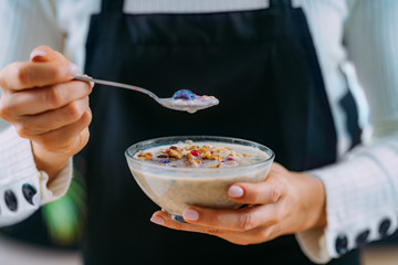 Superfoods - Making oatmeal with Oats, Soy Milk and Berries